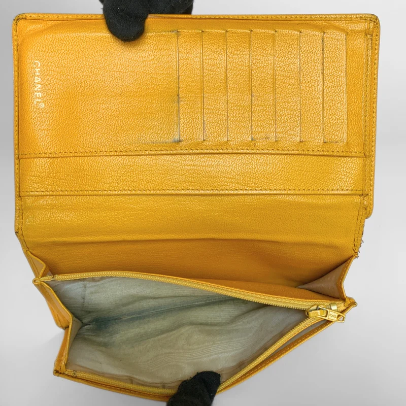 Chanel Portefeuille long CC Coco en cuir caviar à deux volets