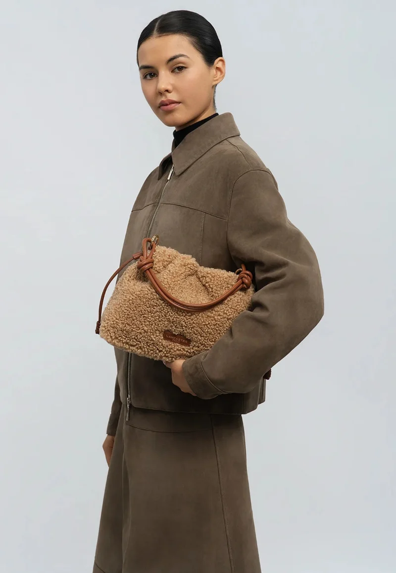 Lancaster Sac besace A lacets coulissants M Moumoute Cognac